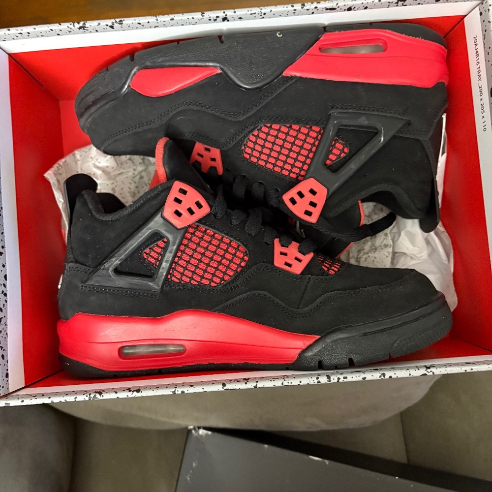 The Air Jordan 4 Red Thunder size 5y